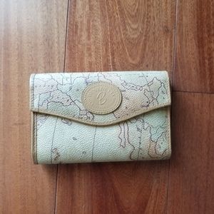 SOLD Tan wallet with world map pattern